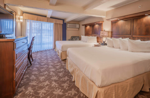 Lakewood Coastal Queen guest room with multiple queen beds, Lake Lawn Resort