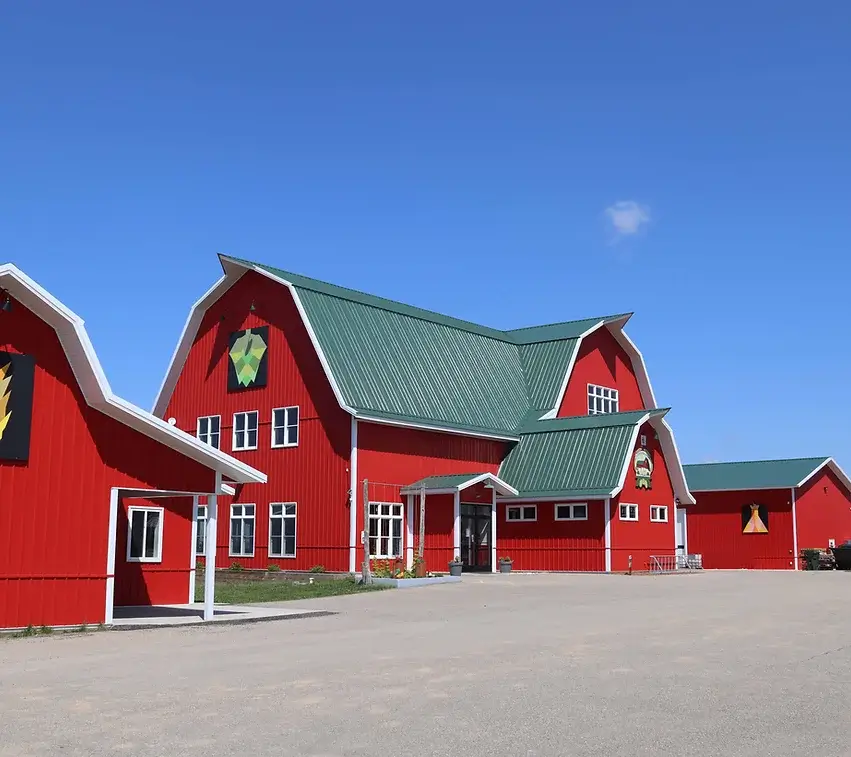 Duesterbeck's Brewing Company building. The building is red and looks like a barn.