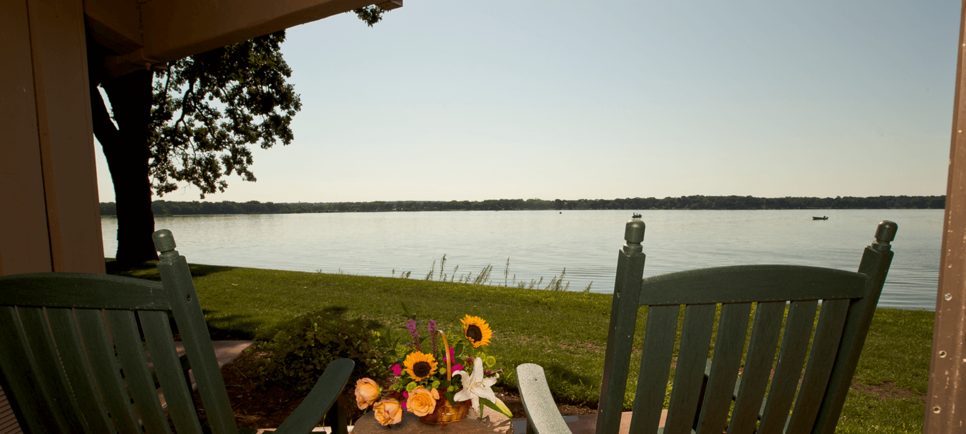 Rocking chairs at Lake Lawn Resort. The chairs overlook Delavan Lake.