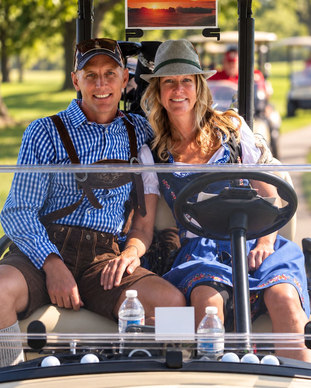 Golfers in Oktoberfest attire at the Craft Brew Open at Majestic Oaks Golf Course